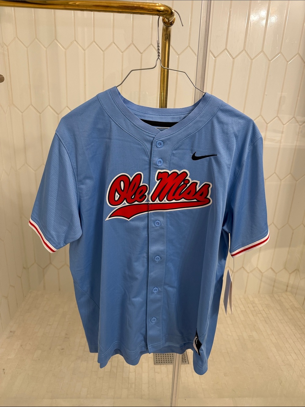 Nike Kids Light Blue Ole Miss Baseball Jersey with Red Script